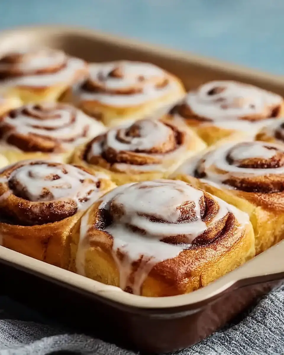A delicious plate of The Best Cinnamon Rolls EVER (Soft, Fluffy & Homemade)